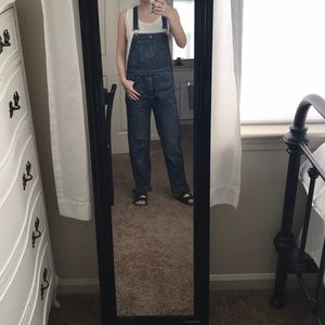 Levi distresses overalls